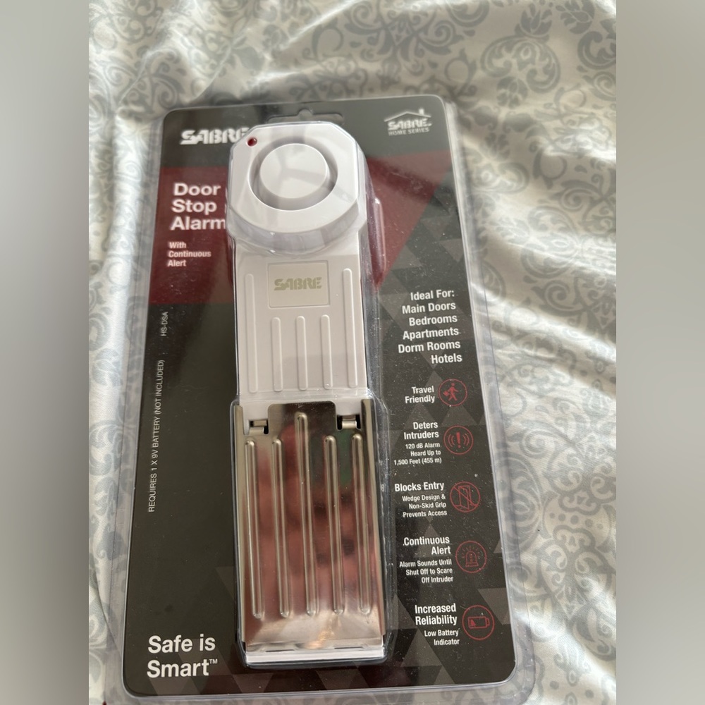Be safe! Portable door alarm. Never used. Still in packaging
